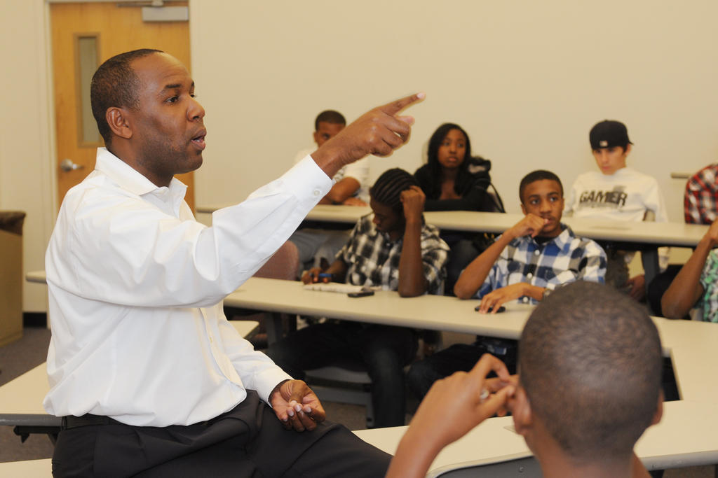 Kevin Clark, CEHD faculty, works with youth from underserved communities to develop computer games. 