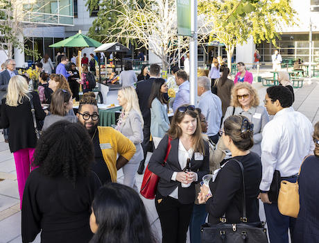 people at reception on Mason Square plaza